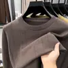 Suéter jacquard de cuello redondo transfronterizo para hombre, nuevo modelo de otoño 2026, color liso, capa interior casual simple, suéter de punto para hombre