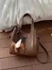Bolso de Mujer de Moda Estilo Coreano Transfronterizo 2026 Nuevo Bolso de Hombro para Mujer Bolso Cruzado Casual Bolso Cubo Retro