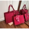 Bolsa Roja de Boda Transfronteriza Bolsa de Gran Capacidad para Mujeres 2025 Nueva Bolsa de Hombro de Alta Gama para Viajar al Trabajo Bolsa Tote de Boda