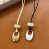 Collar con colgante largo ovalado hueco mate irregular, cadena para la clavícula casual de nicho de alta gama, cadena para suéter, accesorio para el cuello