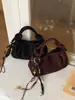 Elegante bolso de mano plisado 2026 nuevo popular retro simple bolsa de albóndiga nicho moderno bandolera hobo bag
