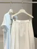 Saia de Botão Floral Estilo Coreano para Mulheres, Verão Elástica de Cintura Alta Emagrecedora Elegante Cor Sólida Versátil Casual Saia Midi em Linha A