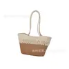 Bolso Tejido Francés Color-Blocking Primavera Verano para Mujer 2026 Nuevo Estilo Bolso de Hombro Tipo Cesta con Patrón Hueco Bolso Tote Ligero