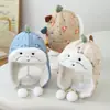 Nuevo sombrero Lei Feng para niños con protección para los oídos, sombrero cálido de estilo coreano con dibujos animados de dinosaurios lindos para invierno, producto transfronterizo para niños