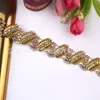 Fabricante al por mayor, venta al por menor de cadenas de plástico con diamantes de imitación, accesorios de ropa, cadena chapada en oro de una sola fila con incrustaciones de diamantes.
