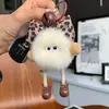 Chaveiro de Coelho com Pompom Mini e Laço Estampa de Leopardo Pingente para Carro Decoração de Mochila Presente