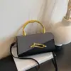 Bolso de Mano de Gran Capacidad Transfronterizo, Elegante Bolso Pequeño Cuadrado para el Hombro, Nuevo Modelo 2026, Bolso Caja de Viaje con Parches de PU de Lujo Ligero