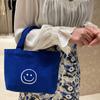 Bolsa de Lona para Mulheres 2025 Nova Bolsa Satchel Smiley Casual Estilo Preppy Estudante Trabalho Versátil Simples Moda