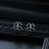 Pendientes de trébol de cuatro hojas con gota de aceite transfronterizos europeos y americanos, modernos y versátiles, pendientes frescos y sencillos para hombre, accesorios de lujo ligero y de alta gama para mujer