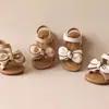 Sandálias de comércio exterior 2025 verão novas sandálias para meninas sandálias coreanas com laço para bebê sapatos de praia sapatos de princesa para crianças