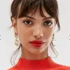 Pendientes divertidos de metal con diseño creativo europeo y americano de Palma sol luna personalidad asimétricos exagerados moda pendientes femeninos Cruz