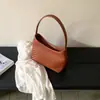 Bolso tejido de nicho estilo coreano, nuevo bolso de mano vintage para otoño e invierno, bolso de axila de lujo ligero versátil para el día a día