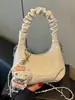 Bolso plisado de alta costura transfronterizo 2026 nuevo modelo cadena bandolera bolso tipo dumpling, elegante y simple estilo coreano nicho bolso de hombro