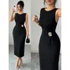 Vestido elegante e sexy de cor sólida, gola redonda, sem mangas, moderno, longo, acinturado, para mulheres, de cruzamento europeu e americano