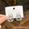 Nuevos Pendientes de Aro Retorcido Brillantes para Mujer, Lujo Accesible y Pendientes de Aguja de Plata S925 de Gama Alta, Elegantes Europeos y Americanos, Sentido del Diseño y Pendientes Simples