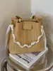 Bolso tipo cubo de alta apariencia 2026 Verano Nuevo de Moda Bolso Cruzado de Cadena Nicho Estilo Relajado Bolso de Mano de Color Sólido