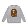 Marca moderna de estilo japonês com estampa de desenho animado de cabeça de macaco, nova blusa de moletom casual de gola redonda em terry de corte solto para homens e mulheres, adequada para adolescentes no outono e inverno