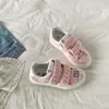 Zapatillas de velcro de moda y únicas con estampado de grafiti para mujer, nueva colección otoño 2026, zapatillas de lona súper populares, garantizado que no son una réplica