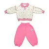 Conjunto de Gatinho Vazado com Manga Sino Estilo Coreano para Meninas Estilo Primavera/Outono 2026 Novo Conjunto de Duas Peças Estiloso para Menininhas Tendência
