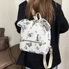 Bolso Cubo Casual Personalizado Estilo Coreano para Mujer Verano 2026 Nicho Nuevo Moda Estilo Académico Mochila con Estampado de Mariposas