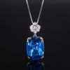 2024 novo Zhuang Shengsheng jóias de cobre banhado a ouro simulação corindo vermelho cristal azul simples temperamento pingente 15*20