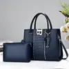 Conjunto de dos piezas de bolsos para mujer, diseño único, nueva moda, versátil para el trabajo, bolso de mano y bolso cruzado