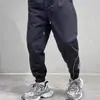 Pantalones de carga de tres barras para hombre, de primavera y otoño, estilo americano, funcionales, impermeables, para montañismo, informales, de corte holgado.