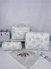 Fornecimento Exclusivo Transfronteiriço de Necessaires de Algodão Estampadas Florais, Bolsas de Viagem Portáteis de Grande Capacidade, Bolsas de Armazenamento de Cosméticos Portáteis Acolchoadas