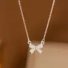 Nuevo Collar Colgante de Estrella con Lazo y Borla Estilo Hada Moda Femenina Simple de Gama Alta Lujo Ligero Cadena para Clavícula