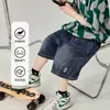 Venta Caliente Moda Infantil Mediano a Grande Pantalones Cortos tipo Capris de Cinco Puntos 26 Estilo Nuevo Shorts de Mezclilla Suave Lavado para Niños