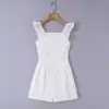 Falda corta abullonada de moda nicho estilo europeo y americano, vestido femenino ajustado que ciñe la cintura, bordado calado con mangas volantes pequeñas