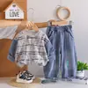 Conjunto de Ropa de Otoño para Niños 2026 Nuevo Estilo Bebé Infantil Primavera Otoño Sudadera con Cadena Colgante de Retazos y Letras Conjunto de Dos Piezas Venta al por Mayor