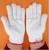 Guantes de nylon blancos de diez agujas 400g500g600g700g tejidos Guantes de hilo de nylon para trabajo Antideslizantes Engrosados