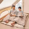 Saco de dormir estilo sobre de alta gama para exteriores de venta caliente personalizado con almohada para adultos, estilo doble para camping, color sólido