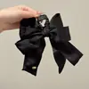 Accesorio de moda para moño Pinza para el pelo de satén Pinza elegante de color sólido de moda Pinza grande para la parte posterior de la cabeza para mujer