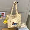 Bolsa de axila para niña perrito linda estilo coreano 2024 Nueva de alto valor en color con puntos de onda Bolso de hombro Bolso tote de viaje combinable