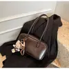 Bolso de bolos de nicho para mujer, nuevo bolso de hombro retro de moda otoño 2026, gran capacidad, rojo