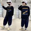 Camiseta de manga larga lisa de algodón puro para niño, camiseta básica para primavera y otoño, nueva prenda superior estampada estilo coreano, elegante y versátil para niños