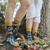 Calcetines originales de moda infantil AB color asimétrico dibujos animados longitud media otoño e invierno caramelos lindos calcetines de algodón para niños y niñas