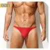 Tanga masculina New Foreign Trade con malla de estrellas, ligeramente transparente, ropa interior masculina sexy de una sola tira, bikini masculino al estilo Pure Desire.