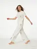 Roupas Femininas Transfronteiriças Verão 2026 Nova Moda Camiseta Estilosa Bordada de Manga Curta + Calça de Corte Reto Conjunto Casual para Mulheres