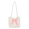 Bolso tote nuevo de nicho con lazo 2026, moderno, dulce, bolso de hombro casual, con bloques de color, bolso de mano versátil