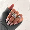 Europeu e Americano transfronteiriço mais vendido retrô feminino preto esmalte gota zircônia preto Pêssego um anel de amor conjunto 7 peças conjunto de anéis