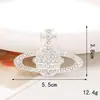 Nuevos Accesorios para Joyería de Corazón con Lazo Arcoíris Incrustado de Diamantes DIY Aleación de Zinc Carcasa para Teléfono Móvil Accesorios de Pegatina Trasera de Belleza