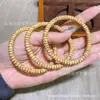 Nuevo Producto Aceite de Pollo Amarillo Estrella Luna Bodhi Pastillas DIY Wenwan Accesorios Pulsera Pulsera Cuentas Cuerda Trenzada Colgante Creativo