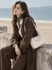 Nova bolsa de mão de couro genuíno tecida à mão estilo 'bolinho' 2026, uma bolsa transversal versátil e estilosa para o dia a dia, com design de luxo leve e elegante