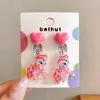 2025 Nuevos Aretes de Clip para Oreja Sin Dolor para Niños Pony Poli Sanrio Brillantes de Dibujos Animados con Almohadilla para Oreja