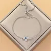 Pulsera de Ojo de Diablo Corazón con Forma de Corazón Cruzada Europea y Americana para Mujer Ajustable Moda Simple Sudeste Asiático