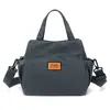 Bolso de Mano Ligero y Compacto para Mujer 2026 Nuevo Modelo Bolso para Viajes Diarios Bolso de Hombro Cruzado Único con Múltiples Bolsillos