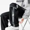 Pantalones rectos de moda con múltiples bolsillos para hombre, corte casual holgado, talla grande, estilo americano, versátiles pantalones cargo deportivos para primavera y otoño